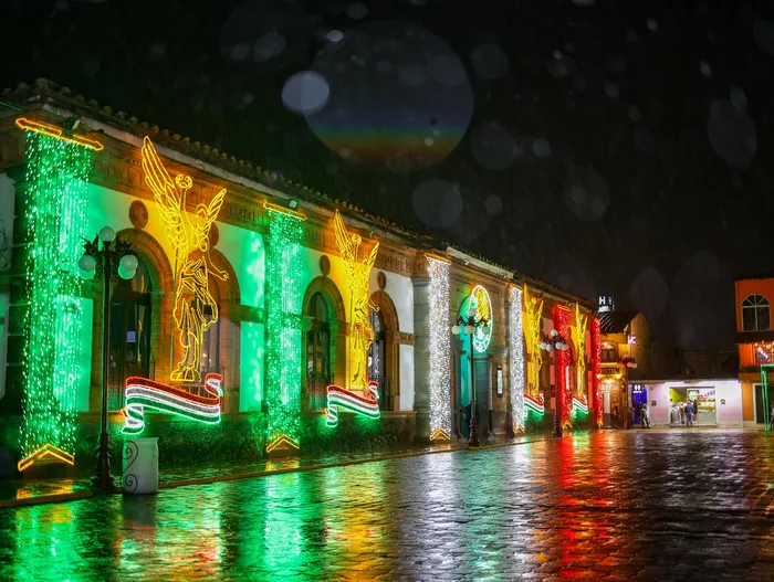 The Town Hall decorated with golden angels and a flag made of lights